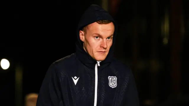 DUNDEE, SCOTLAND - JANUARY 14: Dundee's Scott Tiffoney arrives during a William Hill Premiership match between Dundee and Celtic at the Scot Foam Stadium at Dens Park, on January 14, 2025, in Dundee, Scotland. (Photo by Craig Foy / SNS Group)