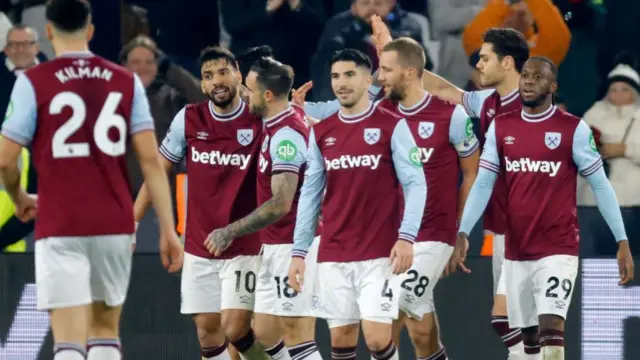 Lucas Paqueta of West Ham United celebrates with teammate Danny Ings