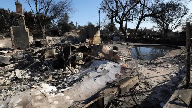 A view of a pool at the site of a home which was burned during the Eaton fire in Altadena