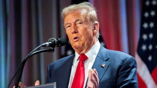 Donald Trump speaks at podium at Republican convention