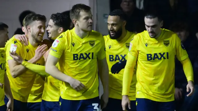 Oxford United players celebrate a goal