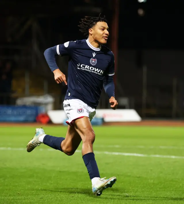 DUNDEE, SCOTLAND - JANUARY 14: Dundee’s Oluwaseun Adewumi celebrates after scoring to make it 1-1 during a William Hill Premiership match between Dundee and Celtic at the Scot Foam Stadium at Dens Park, on January 14, 2025, in Dundee, Scotland. (Photo by Craig Williamson / SNS Group)