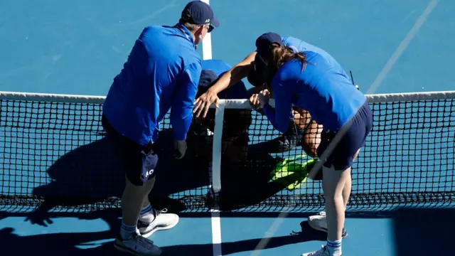 Staff attempt to fix the net