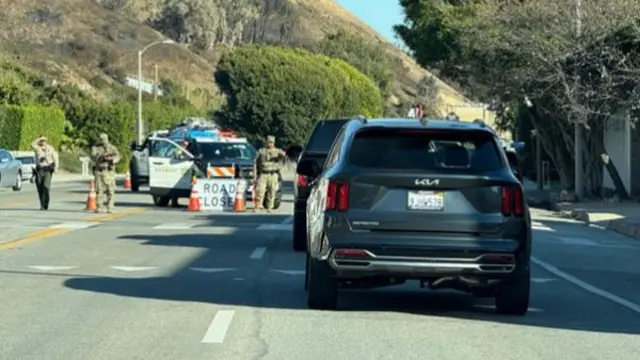 A road block at the entrance to an evacuation zone