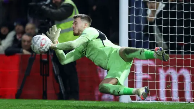 Josh Keeley saves Callum Elder's penalty for Derby