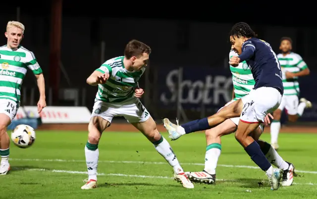 DUNDEE, SCOTLAND - JANUARY 14: Celtic’s Luke McCowan celebrates after scoring to make it 1-0 during a William Hill Premiership match between Dundee and Celtic at the Scot Foam Stadium at Dens Park, on January 14, 2025, in Dundee, Scotland. (Photo by Paul Devlin / SNS Group)