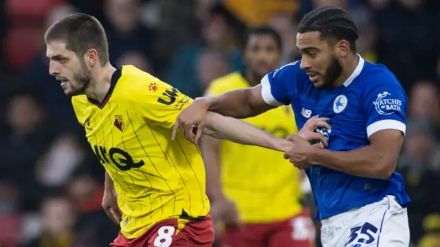 Giorgi Chakvetadze of Watford and Andy Rinomhota of Cardiff City