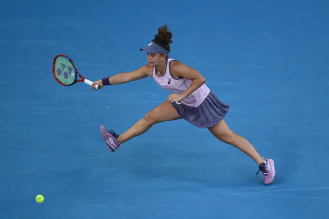 Jasmine Paolini reaches for a forehand