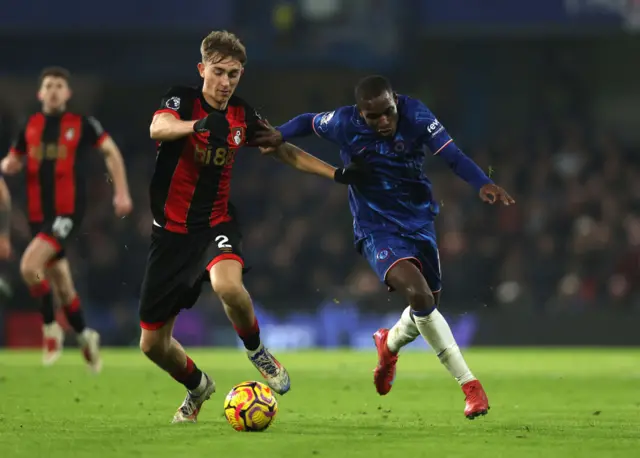 : Dean Huijsen of AFC Bournemouth battles for possession with Nicolas Jackson of Chelsea