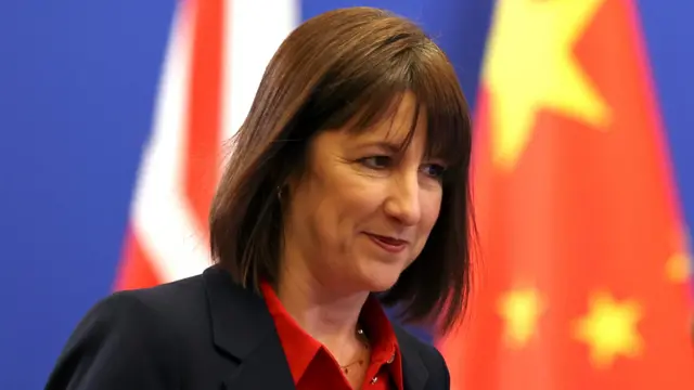 Rachel Reeves in front of a UK and China flag