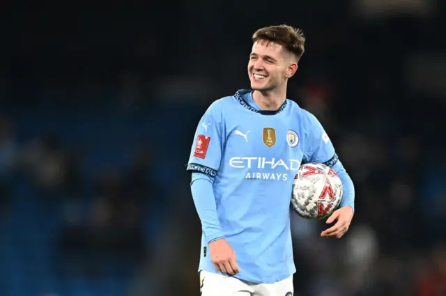 James Mcatee holds the matchball after a hat-trick display