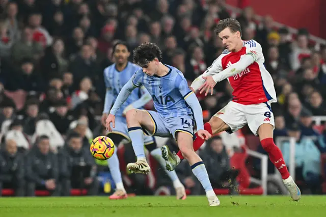 Archie Gray (L) fights for the ball