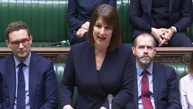 Rachel Reeves, wearing a dark blue jacket, address MPs in the House of Commons