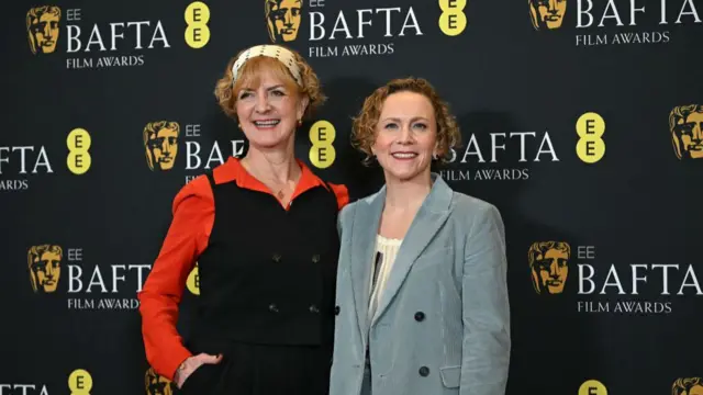 Chairperson Sara Putt (L) and BAFTA Chair of Film Anna Higgs pose for a picture at the the announcement of the British Academy Film Awards