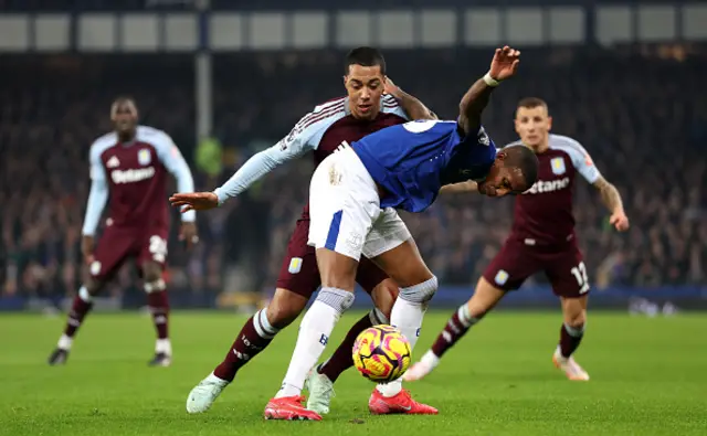 Ashley Young of Everton is challenged by Youri Tielemans