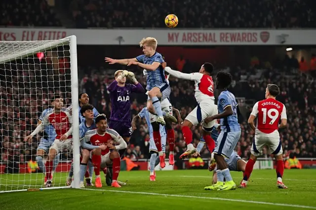 Lucas Bergvall (C) jumps to head the ball