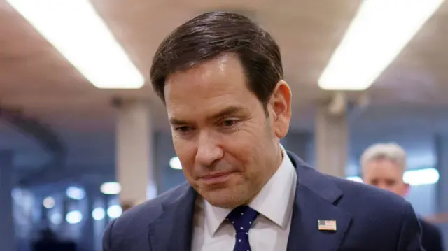 A file photo of Rubio, wearing a suit and a US flag pin