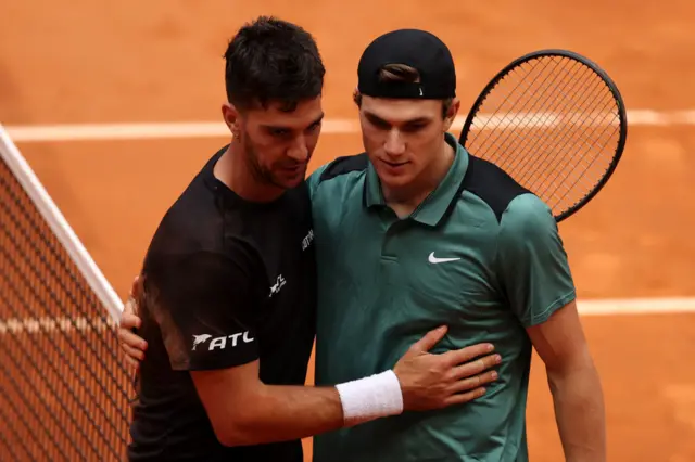 Jack Draper (R) of of Great Britain celebrates winning his match against Thanasi Kokkinakis