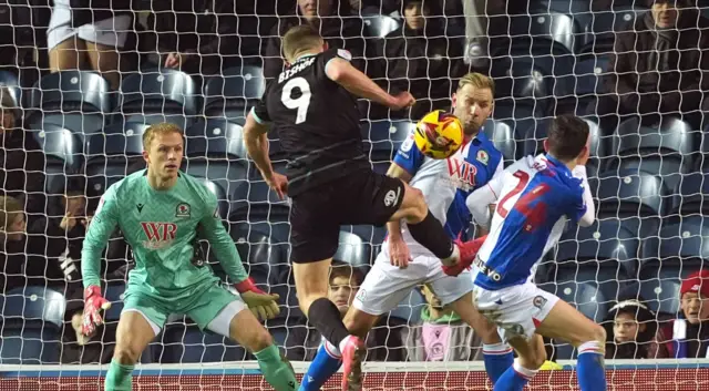 Colby Bishop shoots for Portsmouth versus Blackburn