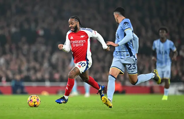 Raheem Sterling of Arsenal runs with the ball