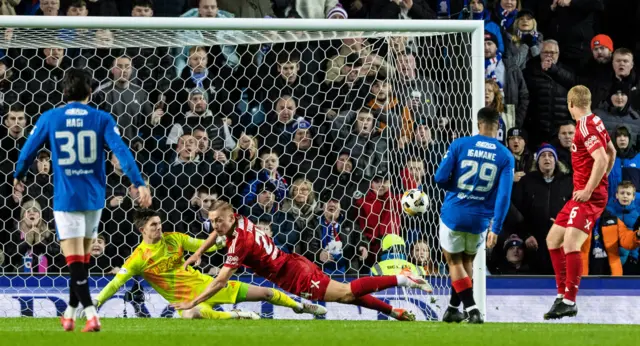 Rangers' Hamza Igamane (centre) scores to make it 1-0 during a William Hill Premiership match between Rangers and Aberdeen at Ibrox Stadium,