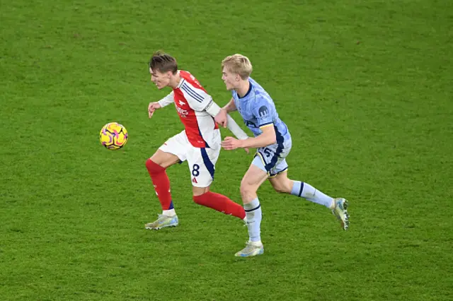 Martin Odegaard of Arsenal runs with the ball