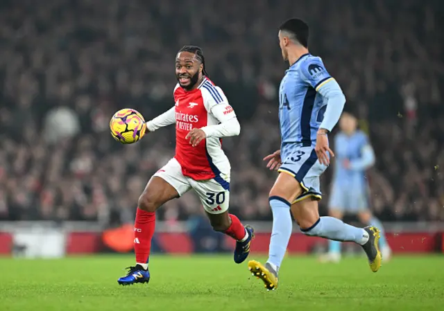 Raheem Sterling of Arsenal runs with the ball