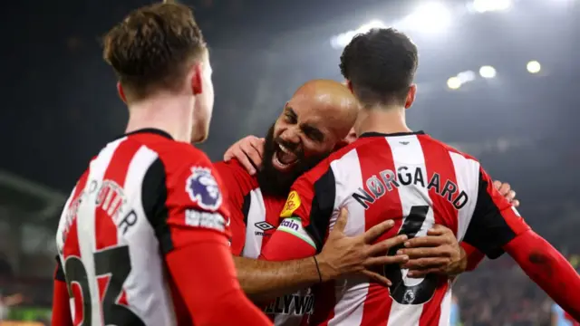 Brentford celebrating their equaliser against Manchester City