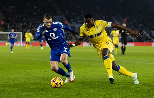 Leicester City's Jamie Vardy (left) competing with Crystal Palace's Marc Guehi