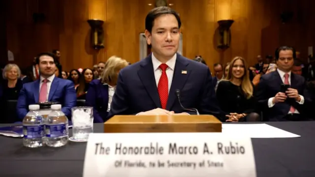 Rubio sitting in the chamber