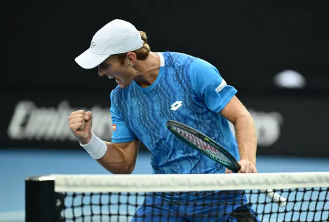 ristan Schoolkate of Australia celebrates a point against Jannik Sinner