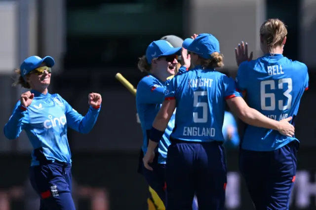 Lauren Bell celebrates wicket