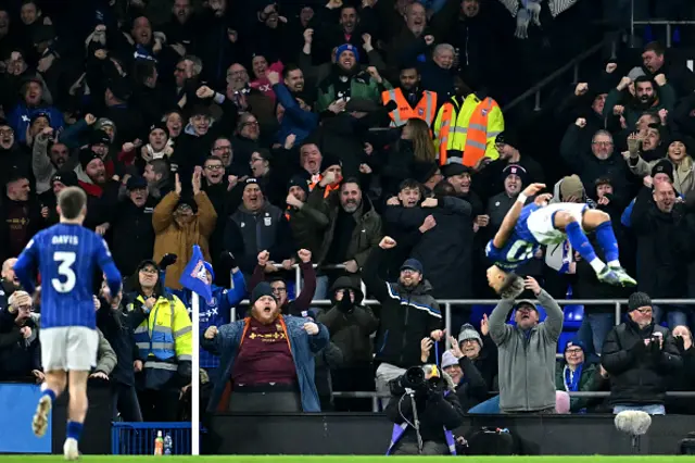 Omari Hutchinson celebrates