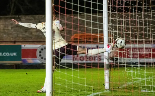 Hearts' Kenneth Vargas tries to steal the goal from Brechin's Kevin McHattie as he scores an own goal to make it 2-1 during a Scottish Gas Men's Scottish Cup Fourth Round match between Brechin City and Heart of Midlothian at Glebe Park, on January 17, 2025, in Brechin, Scotland. (Photo by Paul Devlin / SNS Group)