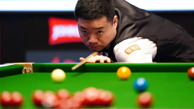 Ding Junhui plays a shot at the Masters