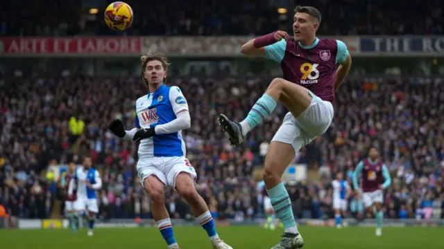 Burnley's Maxime Esteve makes a clearance against Blackburn