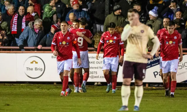 Brechin's Scott Bright celebrates with his teammates as he scores to make it 1-0 during a Scottish Gas Men's Scottish Cup Fourth Round match between Brechin City and Heart of Midlothian at Glebe Park, on January 17, 2025, in Brechin, Scotland. (Photo by Paul Devlin / SNS Group)