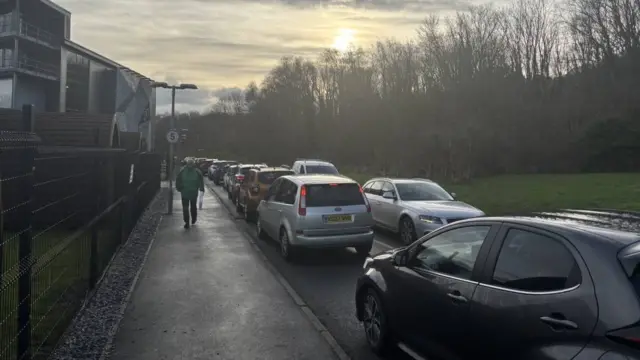 A long line of cars in traffic