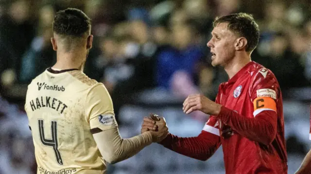 Hearts' Craig Halkett and Brechin's Kevin McHattie at full time during a Scottish Gas Men's Scottish Cup Fourth Round match between Brechin City and Heart of Midlothian at Glebe Park, on January 17, 2025, in Brechin, Scotland. (Photo by Paul Devlin / SNS Group)