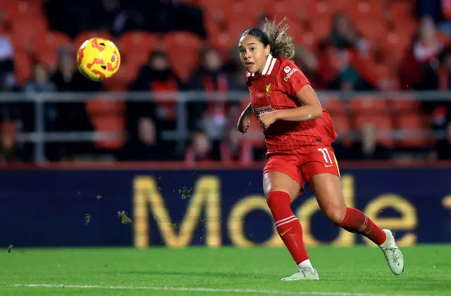 Olivia Smith of Liverpool scores her team's first goal