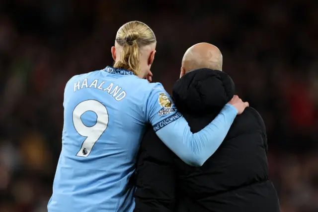 Pep Guardiola and Erling Haaland