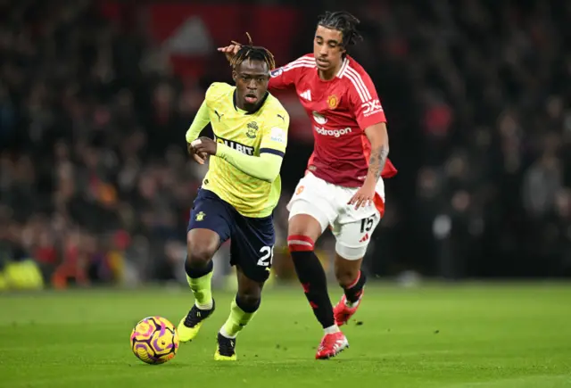 Southampton's Ghanaian midfielder Kamaldeen Sulemana against Manchester United's French defender Leny Yoro