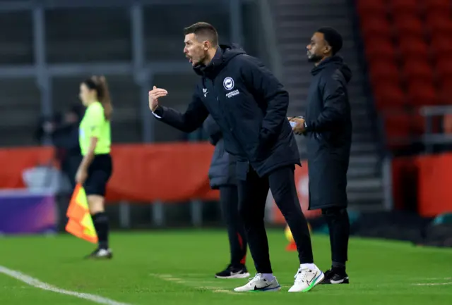 Dario Vidosic, Head Coach of Brighton & Hove Albion, gestures