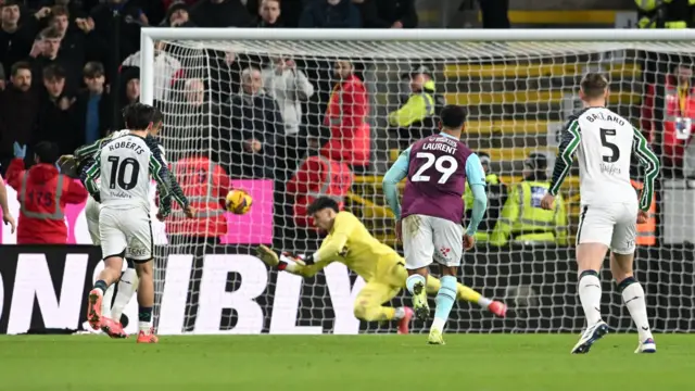 Wilson Isidor of Sunderland sees his penalty saved by Burnley goalkeeper James Trafford