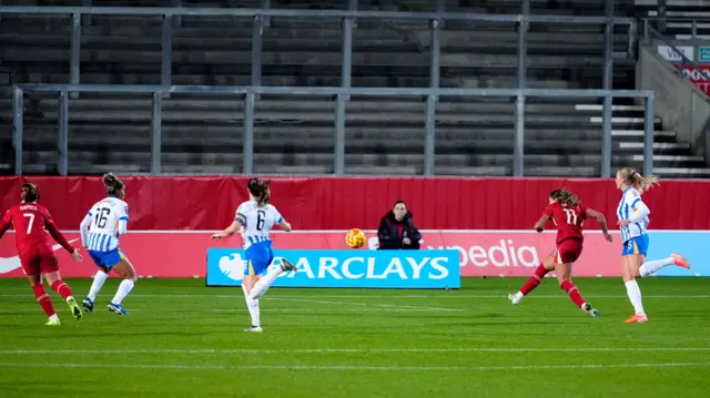 Liverpool's Olivia Smith scores their side's first goal