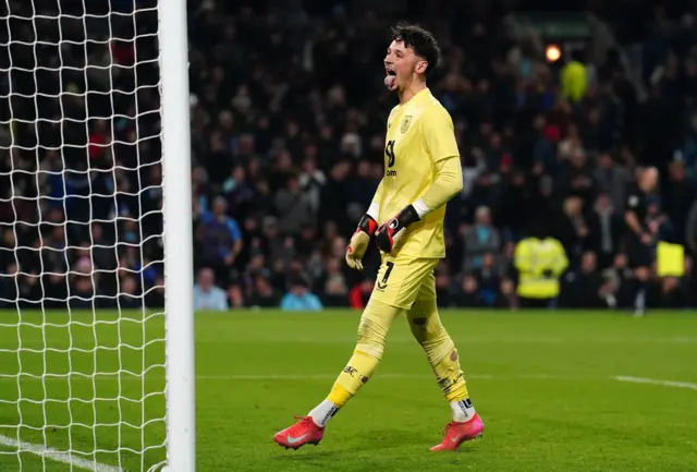 Burnley goalkeeper James Trafford celebrates after saving a penalty from Sunderland's Wilson Isidor