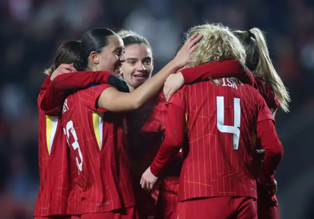 Mia Enderby and Grace Fisk of Liverpool celebrate their side's second goal