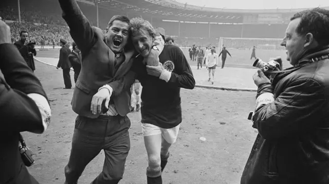 A fan hugging Denis Law after Scotland beat England 3-2 at Wembley in 1967