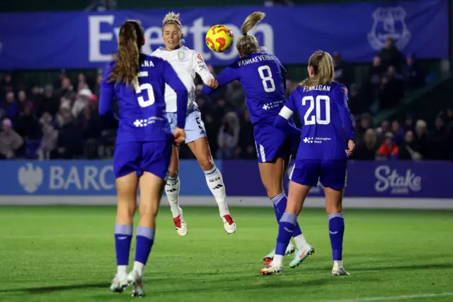 Daly leaps highest to nod the ball into the net