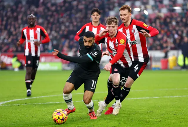 Salah chases the ball against Brentford.